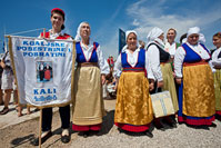 Sisterhood and brotherhood of place Kali on our Lady of the snow procession in Zdrelac, island Ugljan, Dalmatia, Croatia