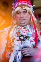 Man dressed as a bride on floklore event Sestine wedding in Zagreb, Croatia