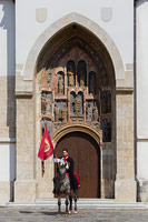 A memeber of honorary cravat regiment during guard change in front of the St. Mark's church in Zagreb, Croatia