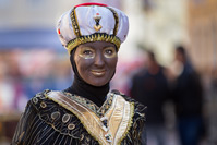 Woman dressed up in a traditional carnival costume Morcic during carnival in town Rijeka, Croatia
