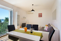 Dining area and living room of apartment Ivanov in place Poljana on island Ugljan, Dalmatia, Croatia