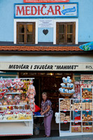 Woman selling souvenirs in Marija Bistrica sanctuary, Croatia