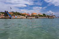 People enjoying on beach Jaz in town Preko, island Ugljan, Dalmatia, Croatia