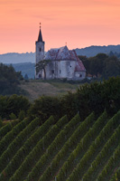 Church of saint Francis Xavier bellow Plesivica hill in autumn sunset, Croatia