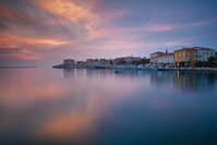 Amazing sunset over the town Porec, Istria, Croatia