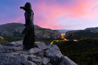 Statue of Croatian folk heroine Mila Gojsalic above river Cetina canyon and town Omis, Dalmatia, Croatia